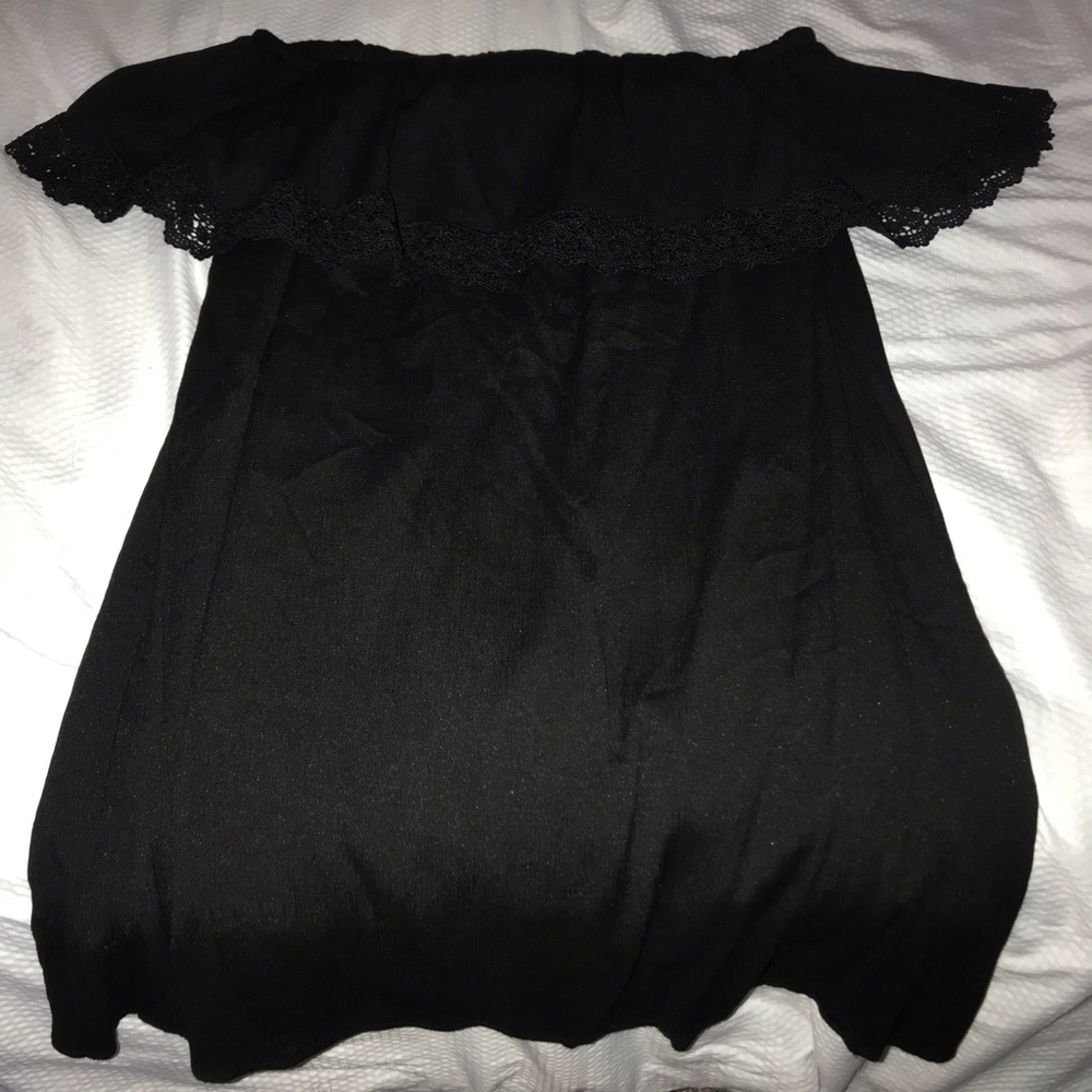 Black off shoulder dress.